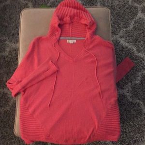 Orange hooded yoga sweater with thumb holes